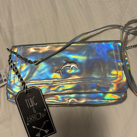 twig and arrow Handbags - NWT holographic Dolphin Crossbody purse